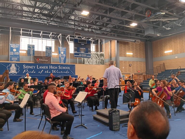 SA Phil warming up to perform at Lanier High School